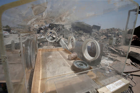 Equipment from an intensive care unit of a maternity hospital, damaged from the war against Islamic State militants, is seen in east Mosul, Iraq August 15, 2017. Picture taken August 15, 2017. REUTERS/Azad Lashkari