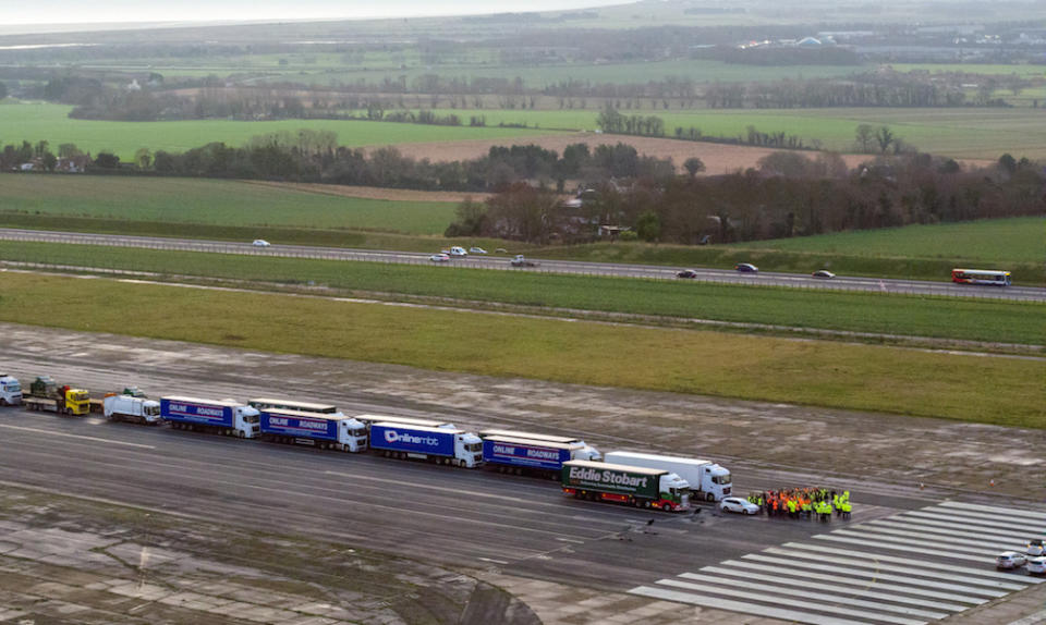 Lorries parked in a queue during a trial at the former Manston Airport site in Kent (Picture: PA)