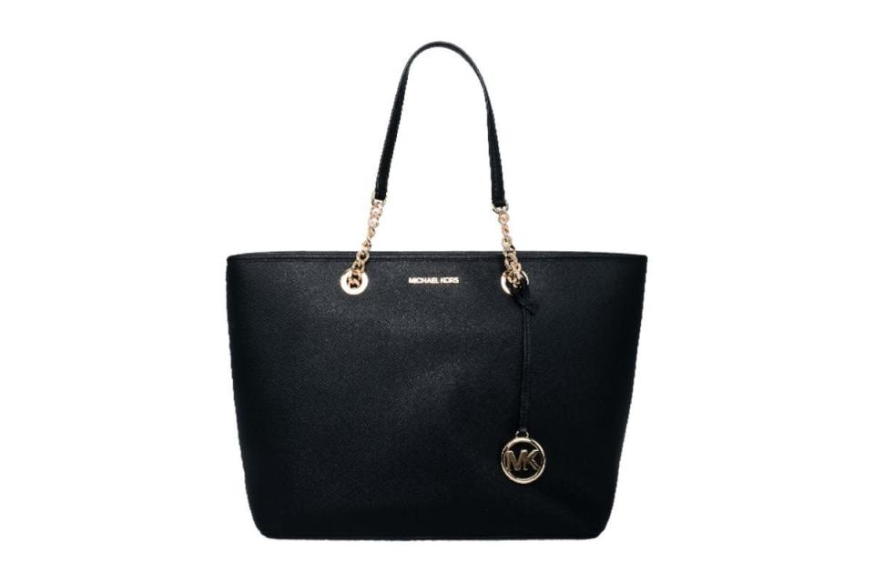  A black handbag with chained straps. Michael Kors Large East West Chain Saffiano Leather Tote for $229