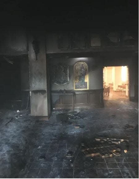Fire damage at Queen of Peace Catholic Church in 2020.