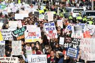 People arrive for the March For Our Lives rally against gun violence in Washington, DC