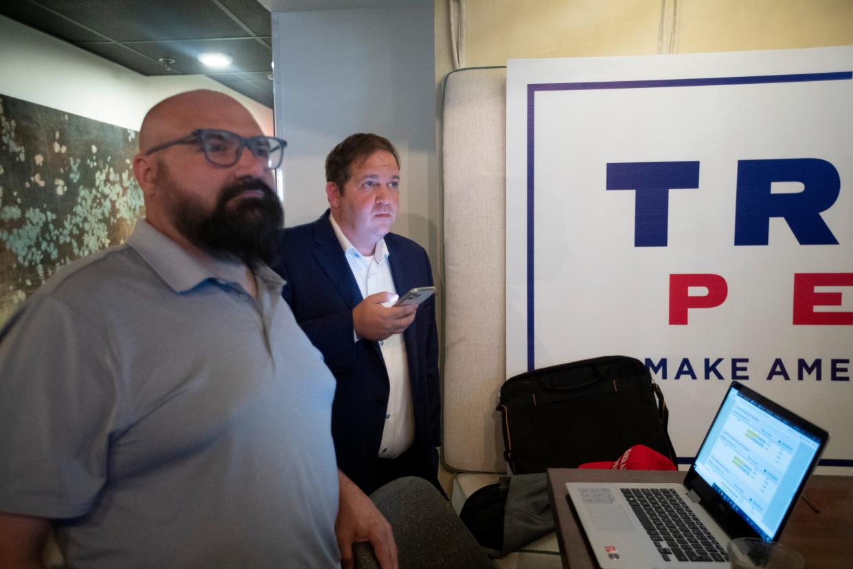 Evan Power watches as election results come in, with a group of party members on Election Night, Nov. 3, 2020.