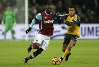 Britain Football Soccer - West Ham United v Arsenal - Premier League - London Stadium - 3/12/16 West Ham United's Pedro Obiang in action with Arsenal's Alexis Sanchez Action Images via Reuters / John Sibley Livepic