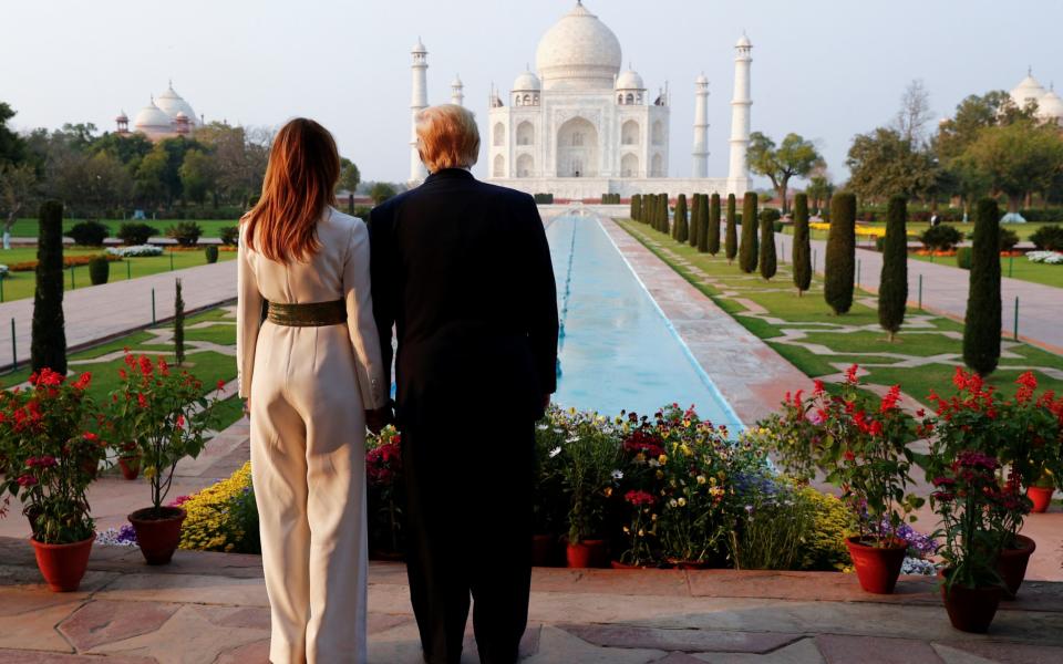 Melania Trump, the first lady, accompanies her husband on a tour of the Taj Mahal - Reuters