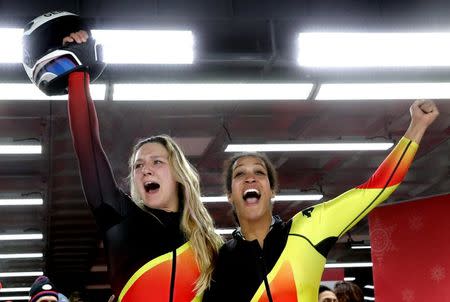 REFILE - CORRECTING ID Bobsleigh - Pyeongchang 2018 Winter Olympics - Women's Finals - Olympic Sliding Centre - Pyeongchang, South Korea - February 21, 2018 - Mariama Jamanka and Lisa Buckwitz of Germany react. REUTERS/Arnd Wiegmann