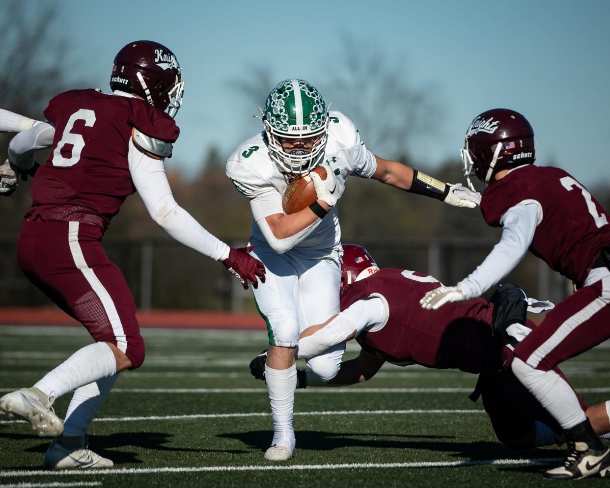 Pembroke's Caleb Felski runs the football under pressure from Frankfort-Schuyler's defense during the 2023 Section III Class D Regional playoff in Waterville, NY on Saturday, November 18, 2023.