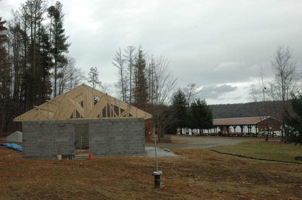 A new shower house and restroom building is being added to the public amenities at the Quemahoning Family Recreation Area, near Hollsopple. The large pavilion is pictured at the right of the photo.