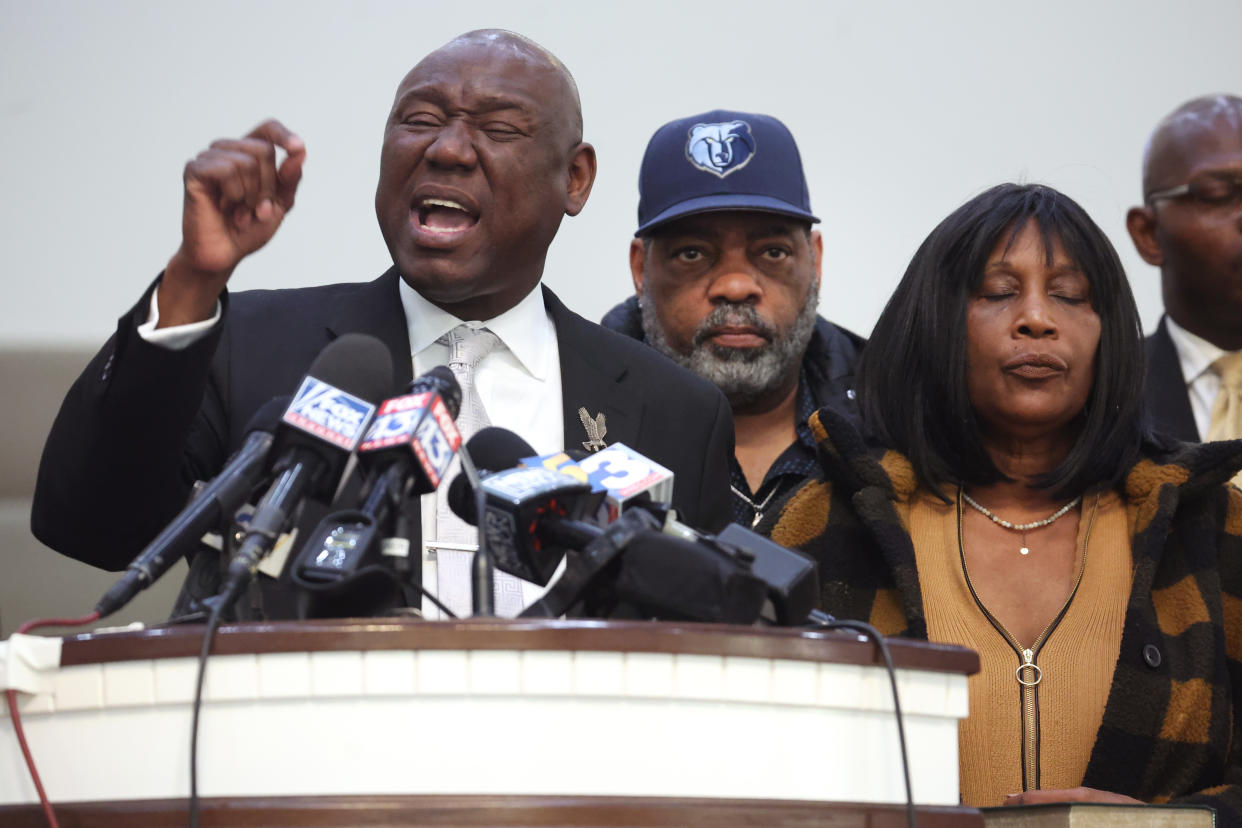 Flanked by Rodney Wells and RowVaughn Wells, the stepfather and mother of Tyre Nichols, civil rights attorney Benjamin Crump speaks during a press conference in Memphis, Tenn.