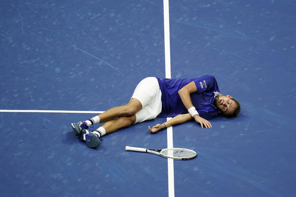 Daniil Medvedev, of Russia, reacts on the court after defeating Novak Djokovic, of Serbia, during the men's singles final of the US Open tennis championships, Sunday, Sept. 12, 2021, in New York. (AP Photo/Seth Wenig)