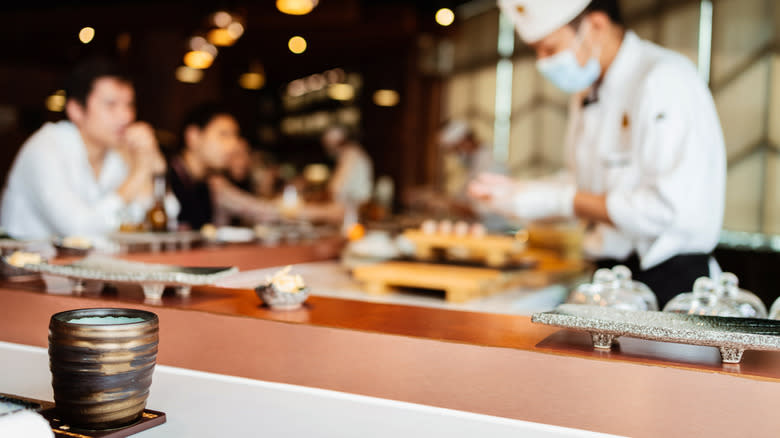 sushi chef preparing omakase