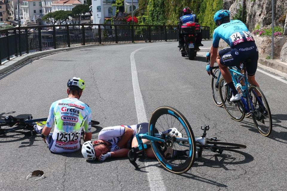 TOPSHOT  Astana Qazaqstan Teams British rider Mark Cavendish falls on  the Valico di Chiunzi during the sixth stage of the Giro dItalia 2023 cycling race 162 km between Naples and Naples on May 11 2023 Photo by Luca Bettini  AFP Photo by LUCA BETTINIAFP via Getty Images