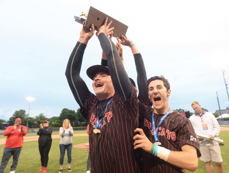 From left, Milton co-captains Charles Walker and catcher Shea Donovan celebrate at the conclusion of their championship game. Milton baseball versus King Philip in the MIAA D2 state championship game at Fitton Field in Worcester on Saturday, June 18, 2022.