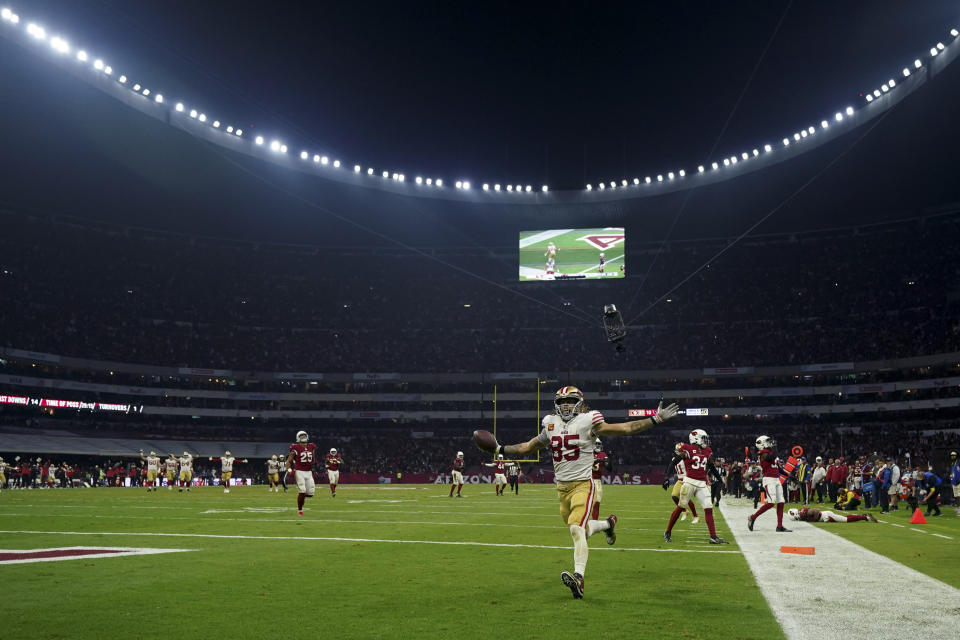 San Francisco 49ers tight end George Kittle celebrates after scoring a touchdown during the second half of an NFL football game against the Arizona Cardinals, Monday, Nov. 21, 2022, in Mexico City.(AP Photo/Fernando Llano)