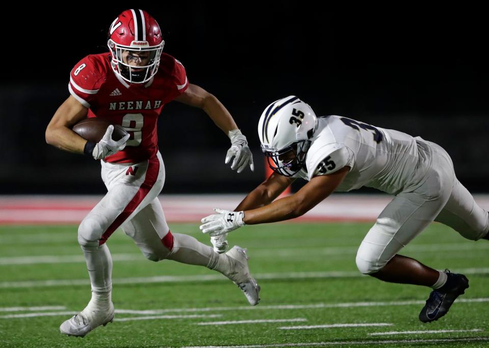 Neenah's Grant Dean has rushed for 1,405 yards and 21 touchdowns in leading the Rockets to the WIAA Division 1 postseason.