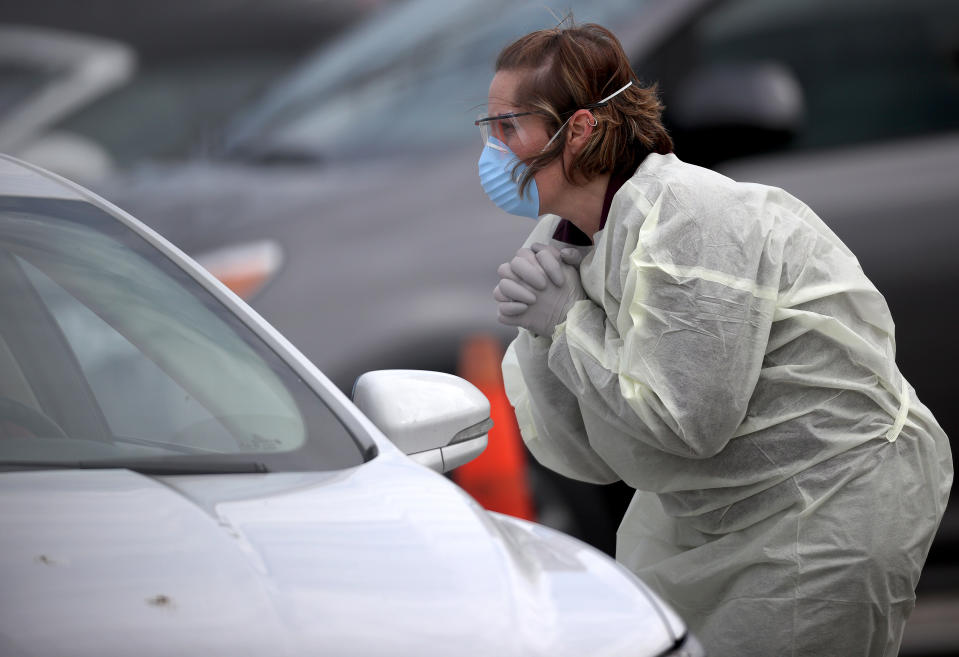 LEONARDTOWN, MARYLAND  - MARCH 17: Nurses screen patients for COVID-19 virus testing at a drive-up location outside Medstar St. Mary's Hospital on March 17, 2020 in Leonardtown, Maryland. The facility is one of the first in the Washington, DC area to offer coronavirus testing as more than 5,200 cases have been confirmed in the United States, and more than 90 deaths have been attributed to the virus. (Photo by Win McNamee/Getty Images)