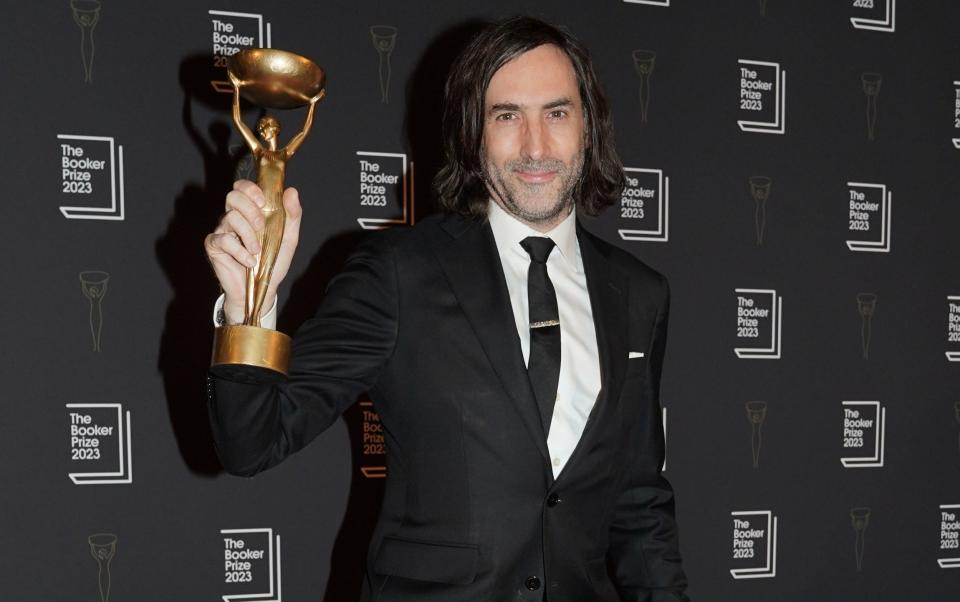 Paul Lynch holds the Booker Prize trophy after being named as the winner of the 2023 Booker Prize