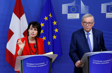 Swiss President Doris Leuthard and European Commission President Jean-Claude Juncker address a joint news conference after their meeting at the EU Commission headquarters in Brussels, Belgium, April 6, 2017. REUTERS/Francois Lenoir