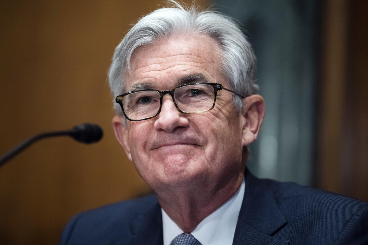 FILE- Federal Reserve Chairman Jerome Powell testifies before the Senate Banking Committee hearing, on March 3, 2022 on Capitol Hill in Washington. The Senate Banking Committee approved Powell's nomination to a second four-year term as chair of the Federal Reserve on Wednesday, March 16, 2022, ust hours after the Fed began what will be a difficult effort to combat inflation.  (Tom Williams/Pool Photo via AP)