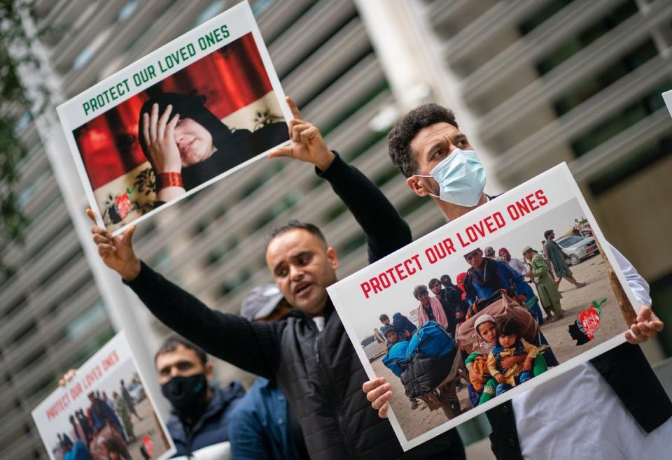 Former Afghan interpreters who are already in the UK protest outside the Home Office in 2021 (PA)