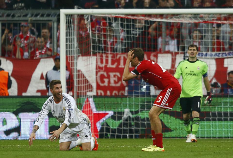 Bayern Munich's Mueller reacts as Real Madrid's Ramos looks on during their Champions League semi-final second leg soccer match in Munich