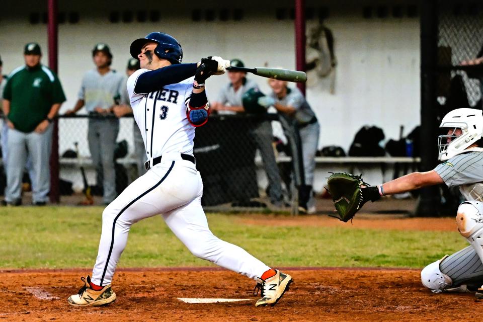 Dwyer's Jackson Miller #3 nails a change up pitch during a regular season game against Jupiter on April 8, 2024.