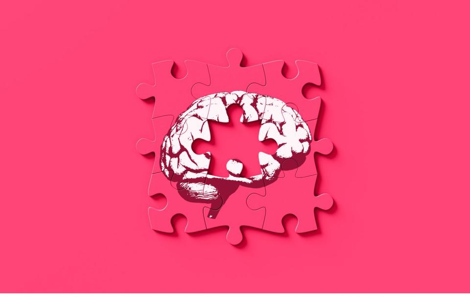 pink jigsaw puzzle of human brain with missing middle piece memory memory loss forgetfulness brain fog