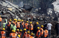 <p>Fire fighters inspect the damages after a blast in a chemical factory in Dombivali, on the outskirts of Mumbai, India, May 26, 2016. According to reports, at least three people were killed and 45 injured during a blast in a boiler unit. (DIVYAKANT SOLANKI/EPA) </p>