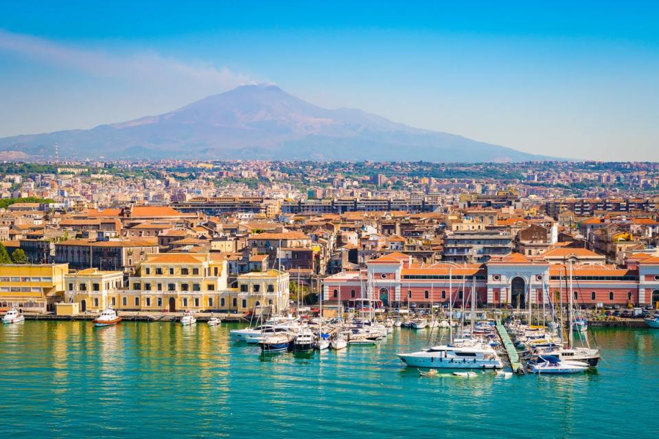 The city of Catania is located close to Mount Etna (Getty Images)