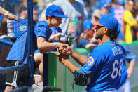 <p>New York Mets pitcher Marcos Molina shakes the hand of a young fan before signing an autograph before the start of a baseball game against the St. Louis Cardinals at First Data Field in Port St. Lucie, Fla., Feb. 24, 2018. (Photo: Gordon Donovan/Yahoo News) </p>