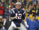 <p>New England Patriots quarterback Tom Brady (12) celebrates after a touchdown by running back LeGarrette Blount (not pictured) against the Pittsburgh Steelers during the third quarter in the 2017 AFC Championship Game at Gillette Stadium. Mandatory Credit: Winslow Townson-USA TODAY Sports </p>