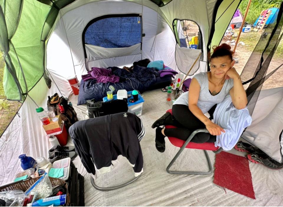 Jacqueline Rodriguez in her big tent, given to her and her partner, Tom, by a friend.