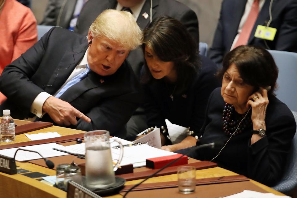 President Donald Trump speaks with his United Nations (U.N.) ambassador Nikki Haley while chairing a United Nations Security Council meeting on September 26, 2018 in New York City. Trump presides over the 15-member council as the United States holds the monthly rotating presidency. The Security Council meeting coincides with the 73rd United Nations General Assembly at the U.N. (Photo by Spencer Platt/Getty Images)