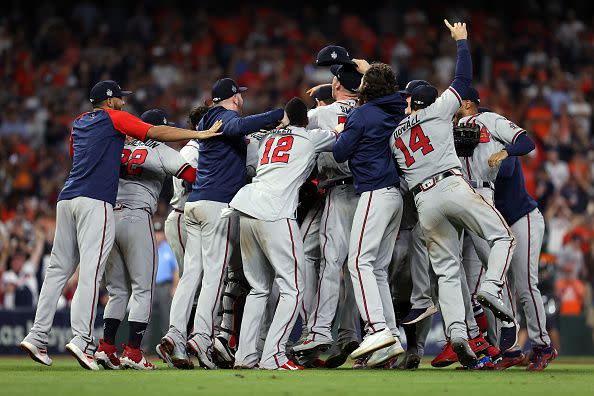 HOUSTON, TEXAS - NOVEMBER 02:  The Atlanta Braves celebrate their 7-0 victory against the Houston Astros in Game Six to win the 2021 World Series at Minute Maid Park on November 02, 2021 in Houston, Texas. (Photo by Elsa/Getty Images)