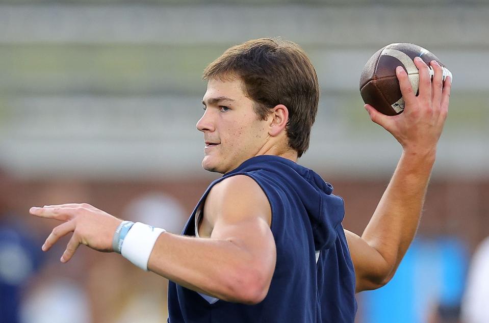 ATLANTA, GEORGIA - OCTOBER 28:  Drake Maye #10 of the North Carolina Tar Heels warms up prior to facing Georgia Tech Yellow Jackets at Bobby Dodd Stadium on October 28, 2023 in Atlanta, Georgia.  (Photo by Kevin C. Cox/Getty Images)