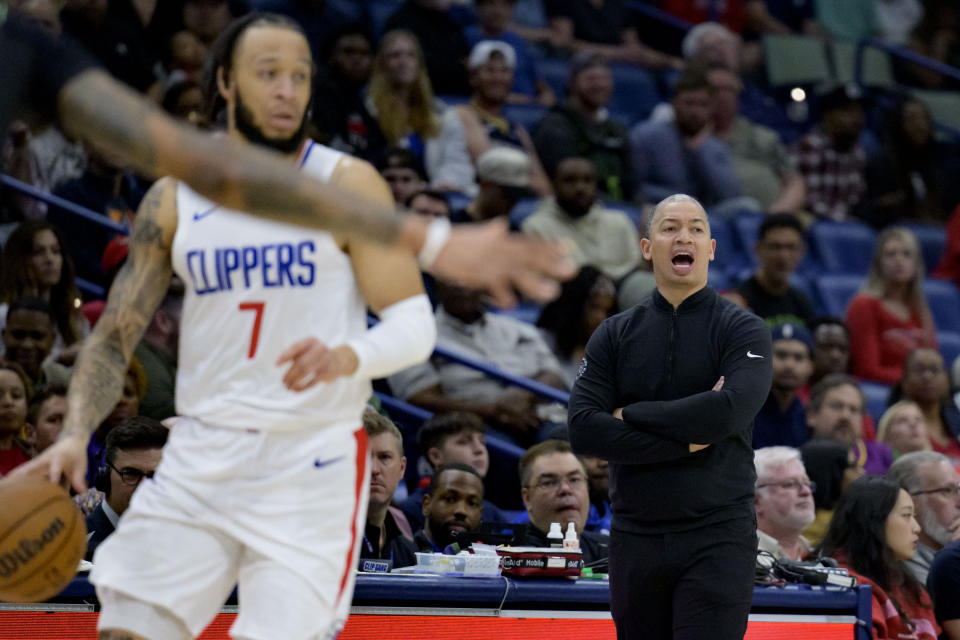 Los Angeles Clippers head coach Tyronn Lue, right, calls to Los Angeles Clippers guard Amir Coffey (7) during the first half of an NBA basketball game against the New Orleans Pelicans in New Orleans, Friday, March 15, 2024. (AP Photo/Matthew Hinton)