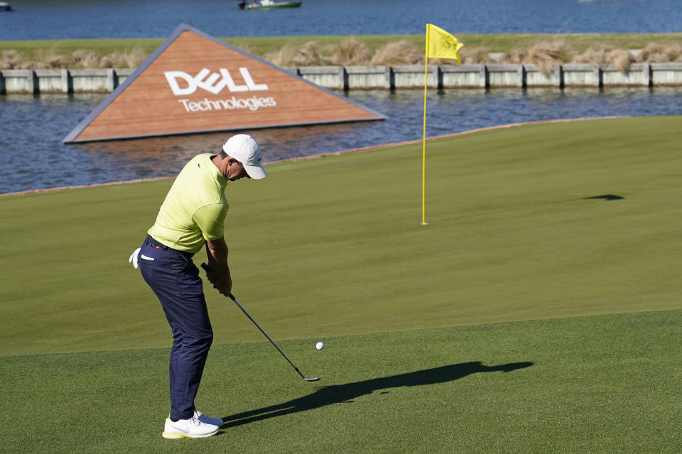 Rory McIlroy of Northern Ireland hits onto the 13th green during a second round match at the Dell Technologies Match Play Championship golf tournament Thursday, March 25, 2021, in Austin, Texas. (AP Photo/David J. Phillip)