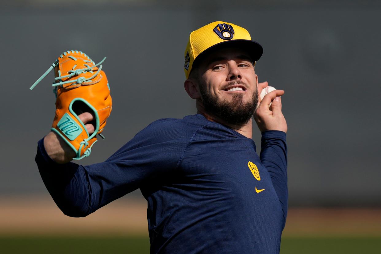 Milwaukee Brewers pitcher DL Hall throws a pitch during spring training workouts in Phoenix, on Thursday, Feb. 15, 2024. (AP Photo/Carolyn Kaster)