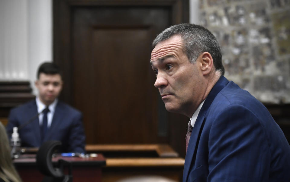 FILE - Kyle Rittenhouse, left, looks on as his attorney Mark Richards questions him as he testifies during his trial at the Kenosha County Courthouse in Kenosha, Wis., on Nov. 10, 2021. Mental health advocates say that during closing arguments, Richards dangerously implied that people with mental illnesses are homicidal and need to be killed. ( Sean Krajacic/The Kenosha News via AP, Pool, File)