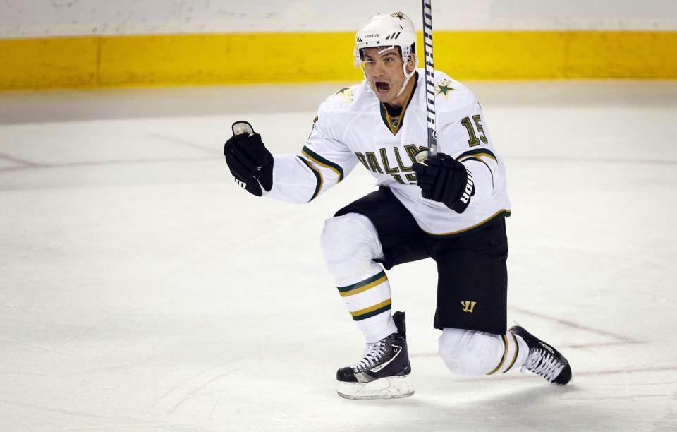 FILE - Dallas Stars' Jamie Langenbrunner celebrates his goal during second-period NHL hockey game action against the Calgary Flames in Calgary, Alberta, Wednesday, Feb. 16, 2011. Former NHL players Dustin Brown and Jamie Langenbrunner highlight the 2023 U.S. Hockey Hall of Fame class unveiled Friday, Sept. 8, 2023, by USA Hockey. (AP Photo/The Canadian Press, Jeff McIntosh, File)