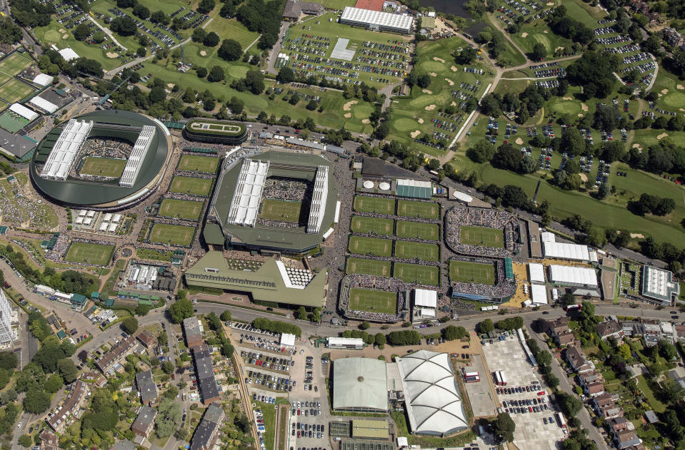 FILE - An aerial view of All England Tennis Club on day seven of the Wimbledon Tennis Championships in London, July 8, 2019. (Thomas Lovelock/AELTC via AP, Pool, File)