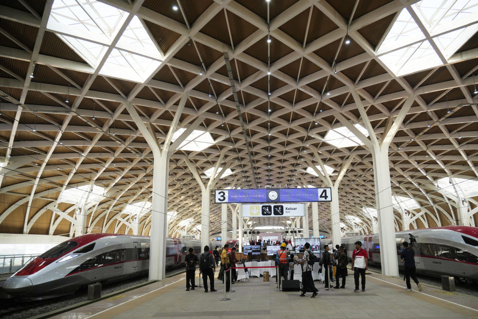 High-speed train is parked during the opening ceremony for launching Southeast Asia's first high-speed railway at Halim station in Jakarta, Indonesia, Monday, Oct. 2, 2023. Indonesian President Joko Widodo launched Southeast Asia's first high-speed railway that will start its commercial operations on Monday, a key project under China's Belt and Road infrastructure initiative that will cut travel time between two cities from the current three hours to about 40 minutes. (AP Photo/Achmad Ibrahim)