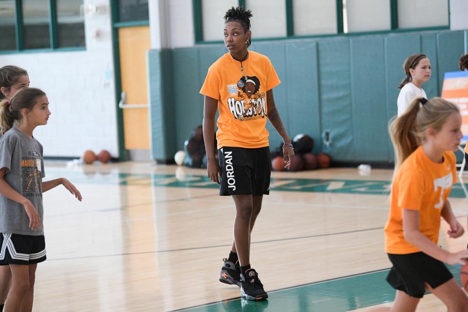 Jordan Horston coaches kids in a drill at a Tennessee Lady Vols basketball summer camp held at Webb School in West Knoxville, Tenn. on Saturday, July 16, 2022.