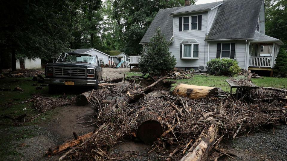 PHOTO: Debris from overnight flooding along Cedar Pond Brook is pictured in Stony Point, New York, July 10, 2023. (Mike Segar/Reuters)
