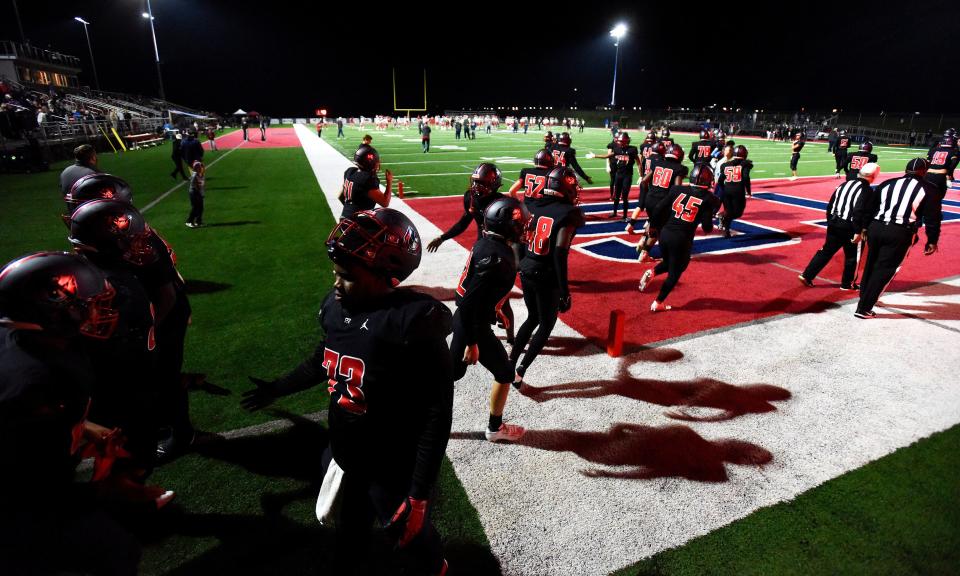 Pike Road takes the field for warm ups before the St. Paul's game during AHSAA football playoff action on the Pike Road High School campus in Pike Road, Ala., on Friday November 12, 2021. 