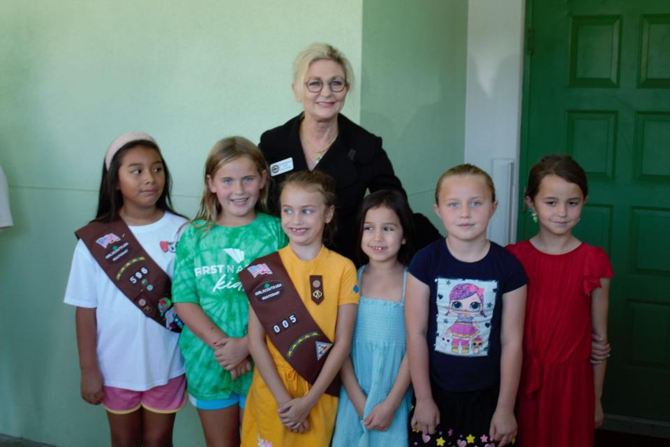 Naples Mayor Teresa Heitmann and Girl Scouts from Troops 596 and 005.