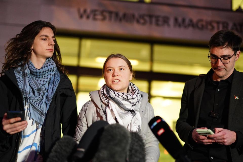 Greta Thunberg speaking to the media (PA)