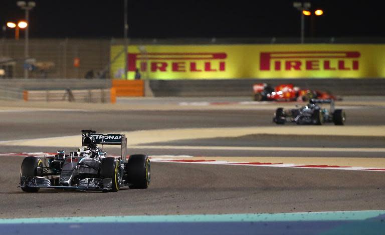 Mercedes AMG Petronas British driver Lewis Hamilton leads during the Formula One Bahrain Grand Prix at the Sakhir circuit on April 19, 2015