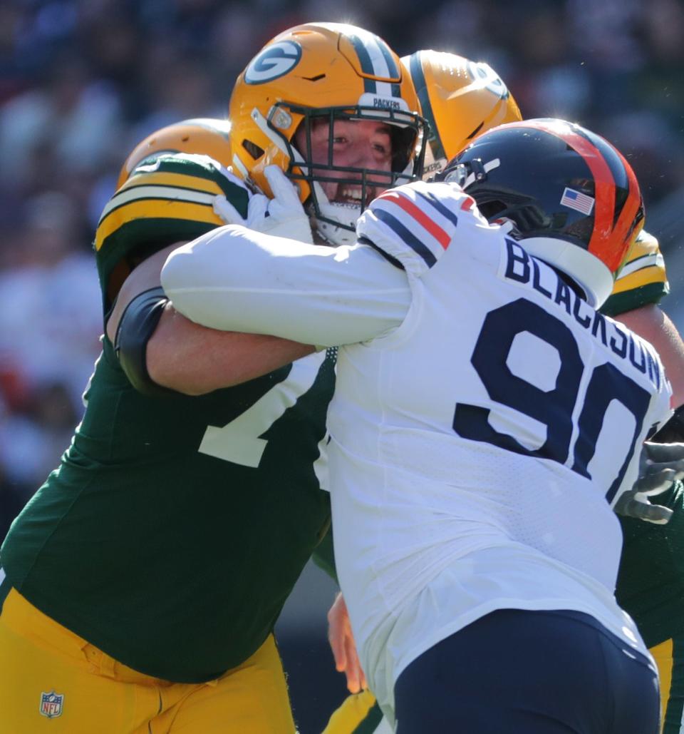 Green Bay Packers guard Royce Newman (70) blocks Chicago Bears defensive end Angelo Blackson (90) during the third quarter of their game Sunday, October 17m 2021 at Solider Field in Chicago, Ill. The Green Bay Packers beat the Chicago Bears 24-14.