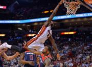 Oct 29, 2014; Miami, FL, USA; Miami Heat forward James Ennis (32) dunks over Washington Wizards forward Rasual Butler (8) during the second half at American Airlines Arena. Miami won 107-95. Mandatory Credit: Steve Mitchell-USA TODAY Sports (TPX IMAGES OF THE DAY SPORT)