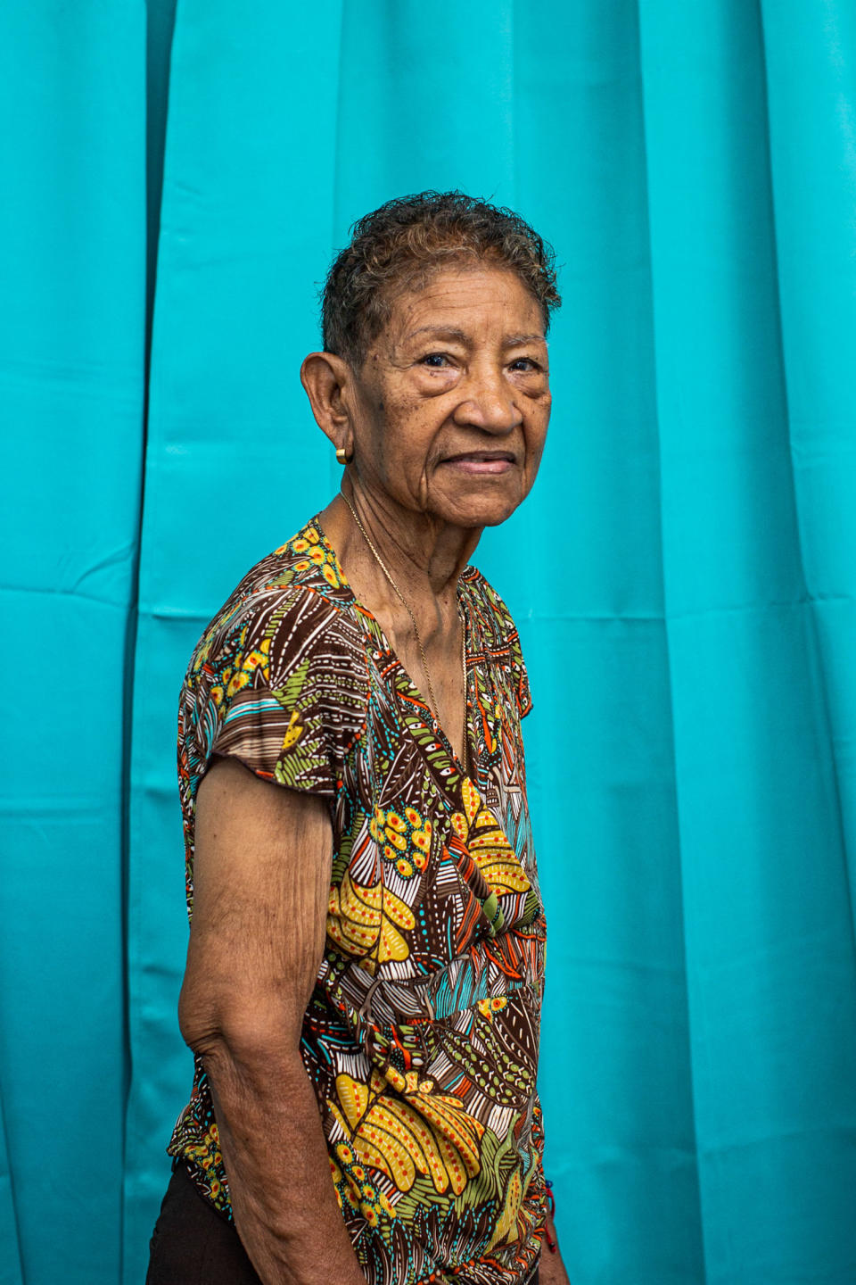 Julia Pérez, 86, at the Center for Activities and Multiple Uses for the Elderly of Toa Baja in Toa Baja, Puerto Rico, on May 26, 2023. (Erika P. Rodríguez for NBC News)